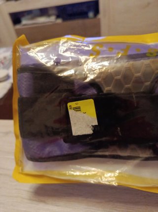 Riñonera nueva negra y morada