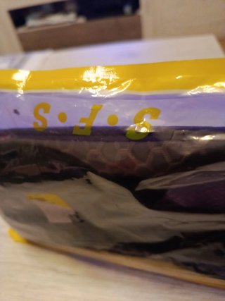 Riñonera nueva negra y morada