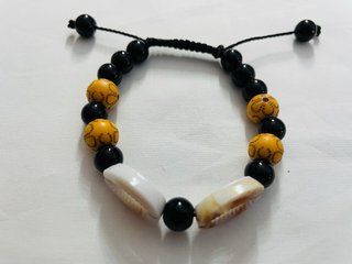 Braccialetti fantasia con conchiglie e perline