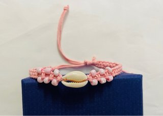 Braccialetti fantasia con conchiglie e perline