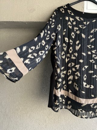 Maglia fantasia animalier e righe