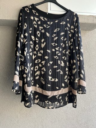 Maglia fantasia animalier e righe