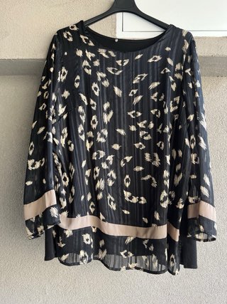 Maglia fantasia animalier e righe