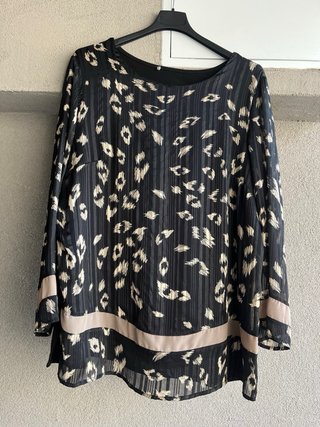 Maglia fantasia animalier e righe