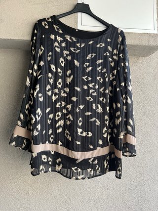Maglia fantasia animalier e righe