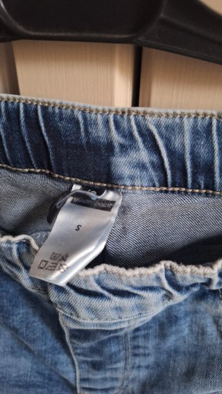 Jeggins strappati vita alta