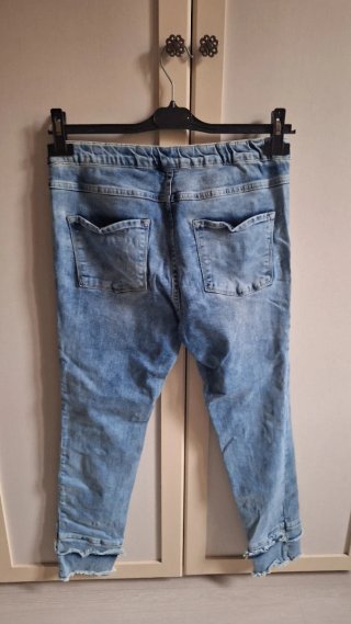 Jeggins strappati vita alta