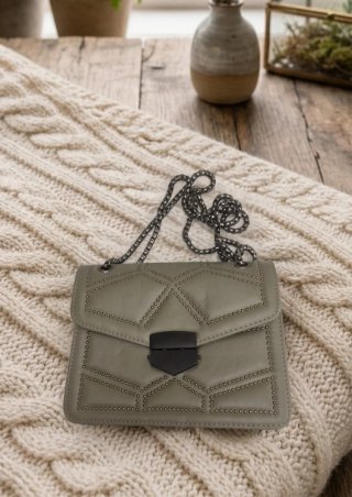 Bolso tachas