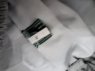Pantalones cortos grises con estampado blanco