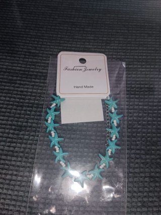 Pulsera estrellas de mar azul y blanco