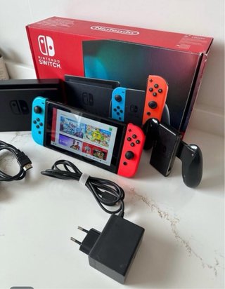 Nintendo Switch V1 funda +cargador origina + grip