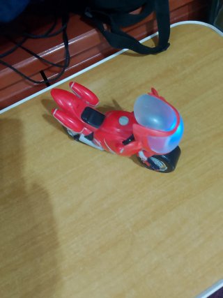 Juguete moto con luz azul