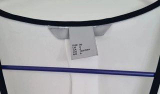 Blusa H&M cruzada blanca talla S