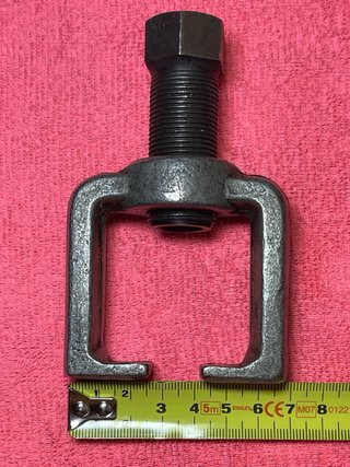 Extractor rótulas coche