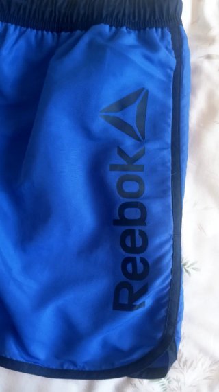Calzonas, bañador, Reebok azules y negras