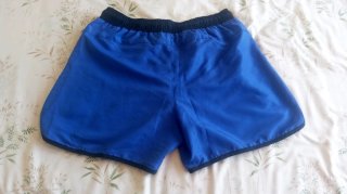 Calzonas, bañador, Reebok azules y negras