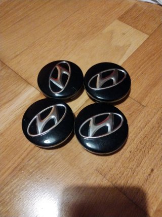Tapabujes llantas Hyundai (4 unidades)