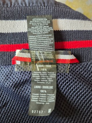 Cazadora cortavientos azul poliéster y nylon