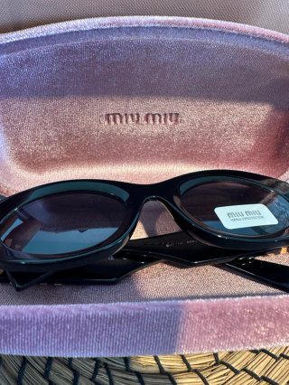 Gafas de Sol Miu Miu Negras y Doradas Mujer