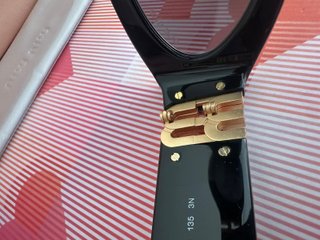 Gafas de Sol Miu Miu Negras y Doradas Mujer
