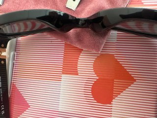 Gafas de Sol Miu Miu Negras y Doradas Mujer