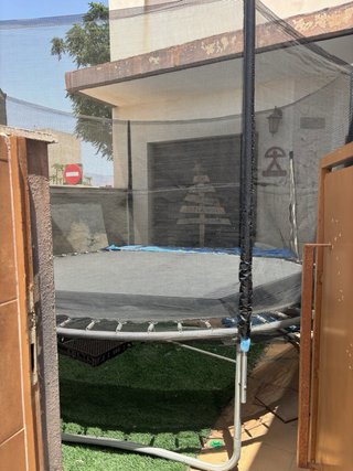Cama elástica con red de seguridad