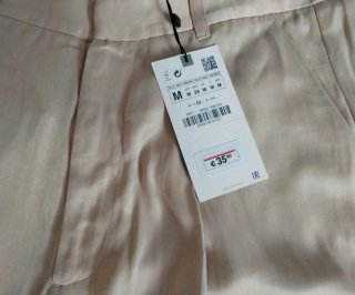 Pantalón Zara satinado beige