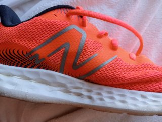 Zapatillas New Balance Naranja y Blanco