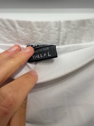 Falda deportiva blanca con detalle estrella