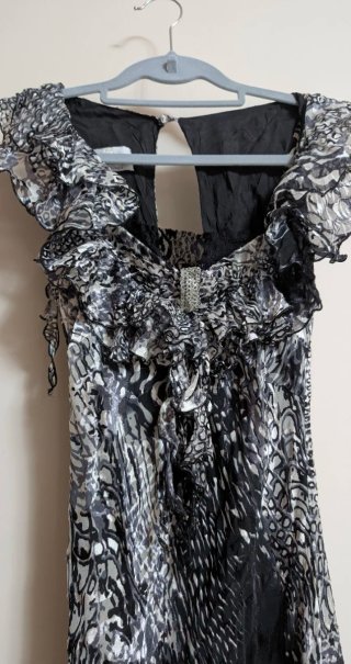 Vestito fantasia nero e grigio