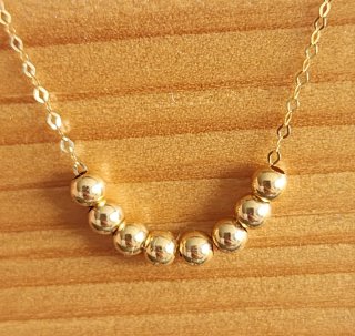 Collar oro 18k con 8 bolas oro 18k
