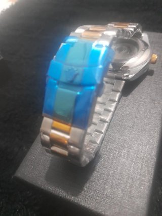Reloj  Elegante Oro y Plata