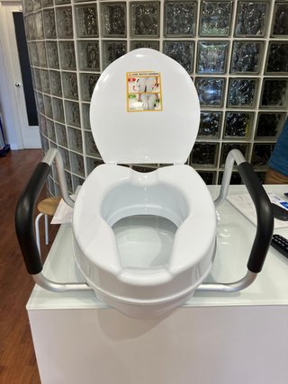 Asiento Elevador para Inodoro con Reposabrazos