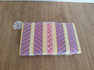 Bolso de fiesta, Nuevo a estrenar