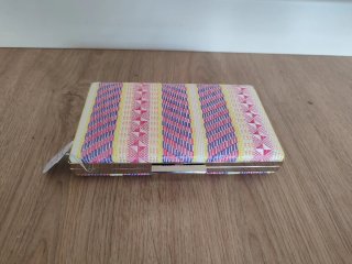 Bolso de fiesta, Nuevo a estrenar