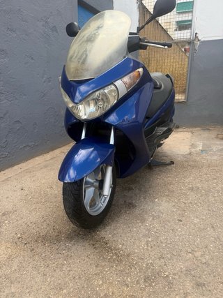 Vendo o cambio  Suzuki Burgman 125cc Azul 2008