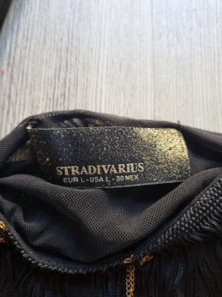 Top Fiesta Flecos Negro Dorado Stradivarius