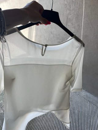 Maglia bianca a strati