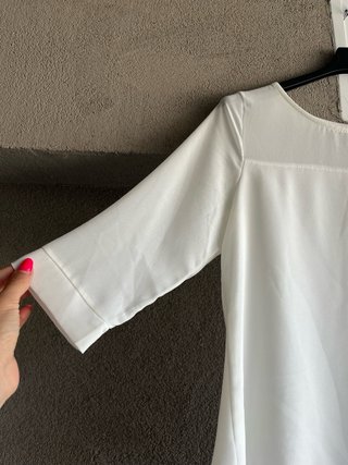 Maglia bianca a strati