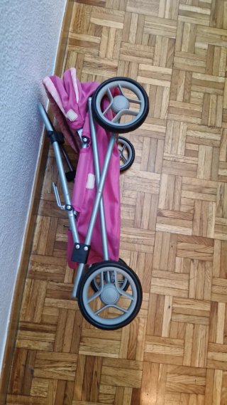 Carro de muñecas rosa