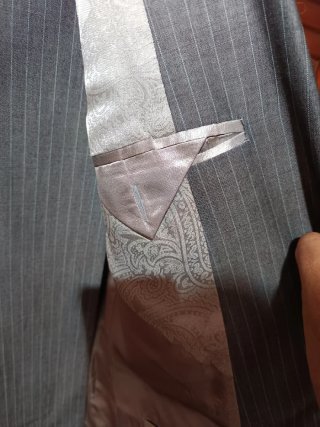 Traje de raya gris