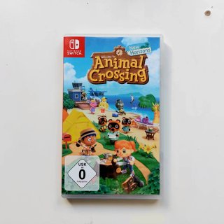 Nintendo Switch Lite Coral + Animal Crossing