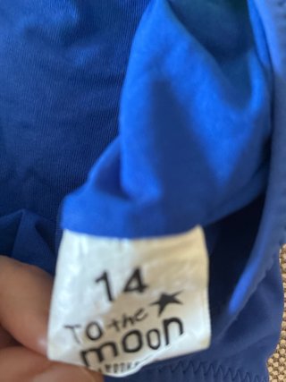 Bañador asimétrico azul y amarillo talla 14 años
