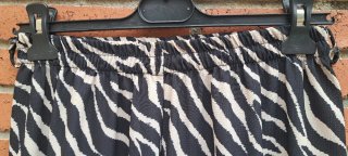 Pantalón fluido estampado cebra