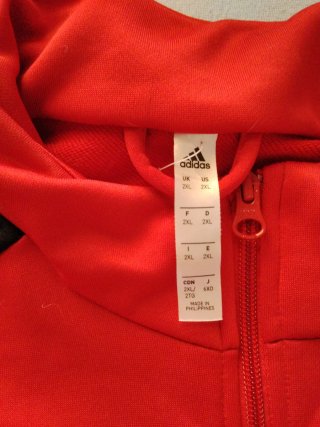 Chaqueta deportiva Adidas roja y negra