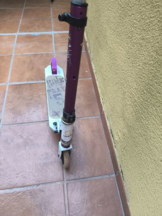 Patinete Oxelo blanco y morado