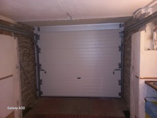 Puerta de garaje seccional nueva