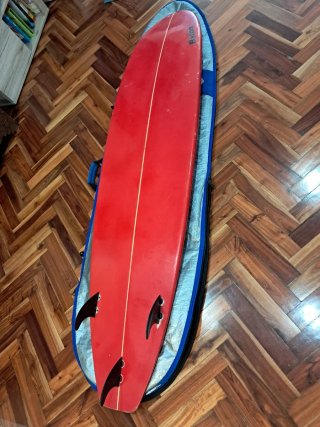 Vendo Tabla de fibra de 7 pies (40litros aprox).