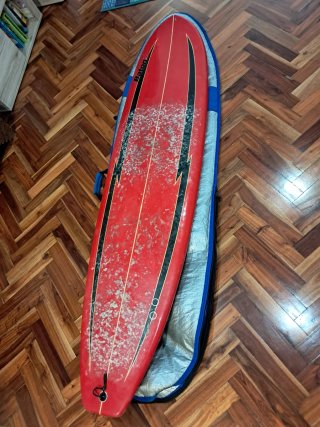 Vendo Tabla de fibra de 7 pies (40litros aprox).