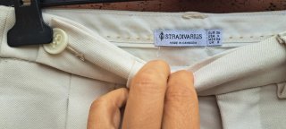 Pantalones beige con pinzas